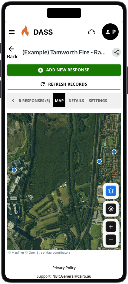 The DASS app on a phone, branded with a flame mark and the word DASS, at the Map tab of a survey named (Example) Tamworth Fire, below Add new response and Refresh records buttons. A satellite map shows three blue record markers over parkland and housing, with layer, locate, and zoom controls. The footer reads Privacy Policy and Support: NBICGeneral@csiro.au.